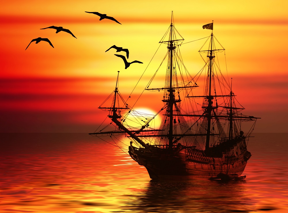 Pirate Ship Sailing in the Sunset