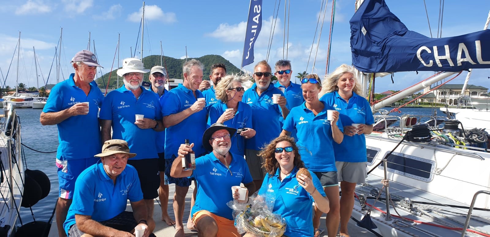 Crew celebrating arrival in St Lucia at the finish of the Atlantic Rally for Cruisers