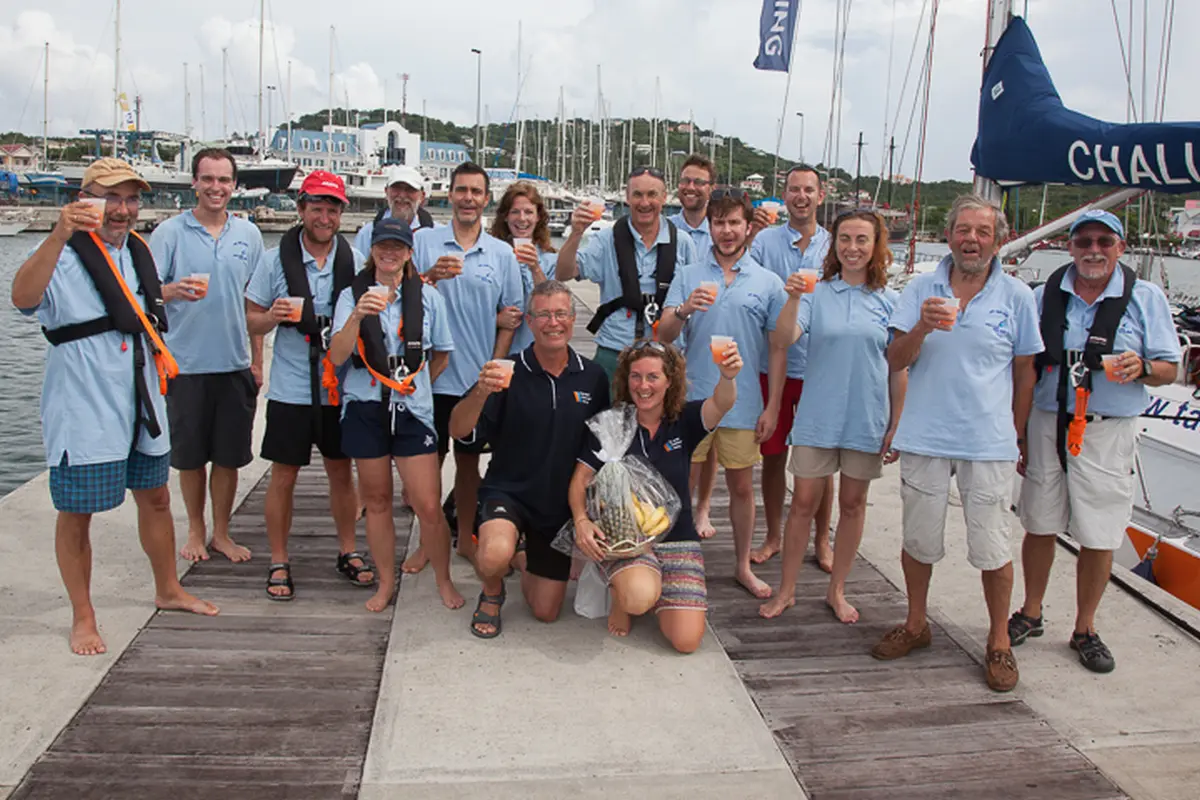 Crew celebrating arrival in Rodney Bay in St Lucia after Atlantic crossing