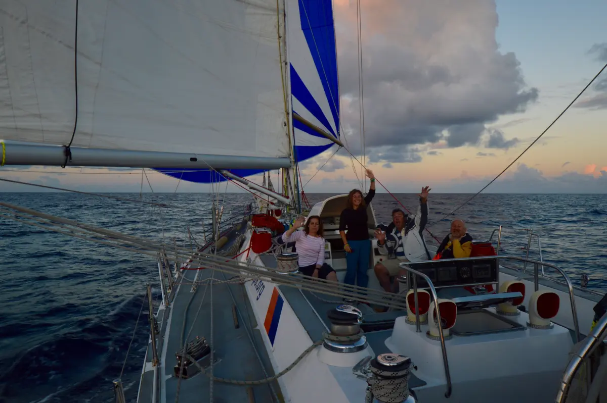 Yacht sailing under full main and genoa across Atlantic swells