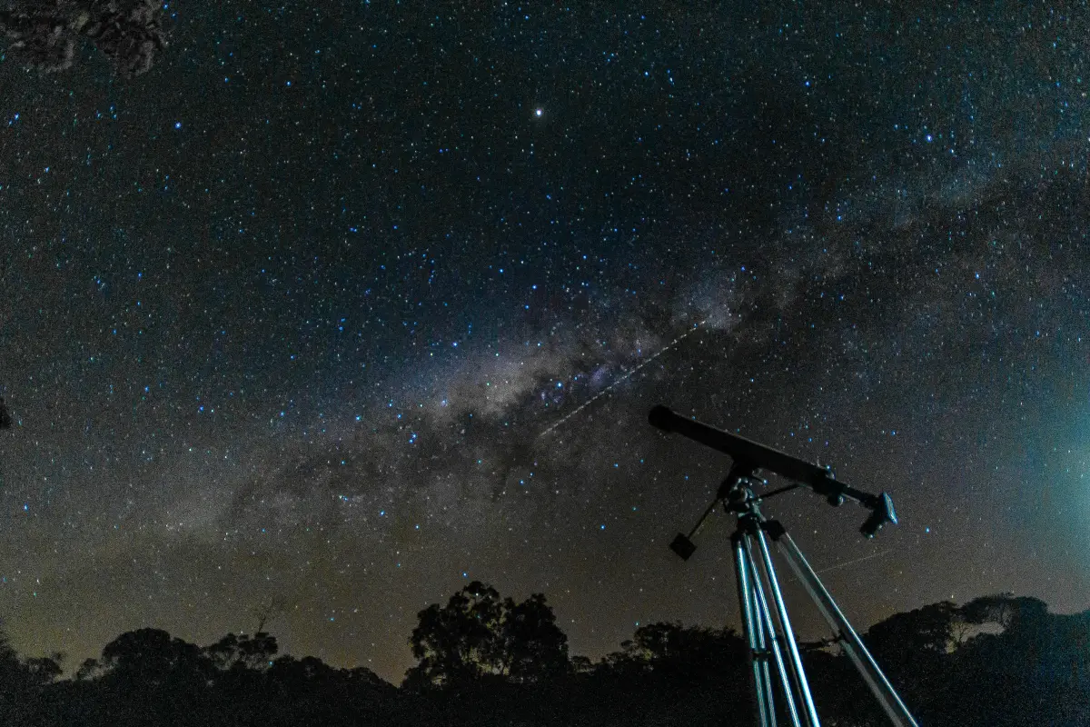 Outdoor stargazing experience beneath a clear night sky.