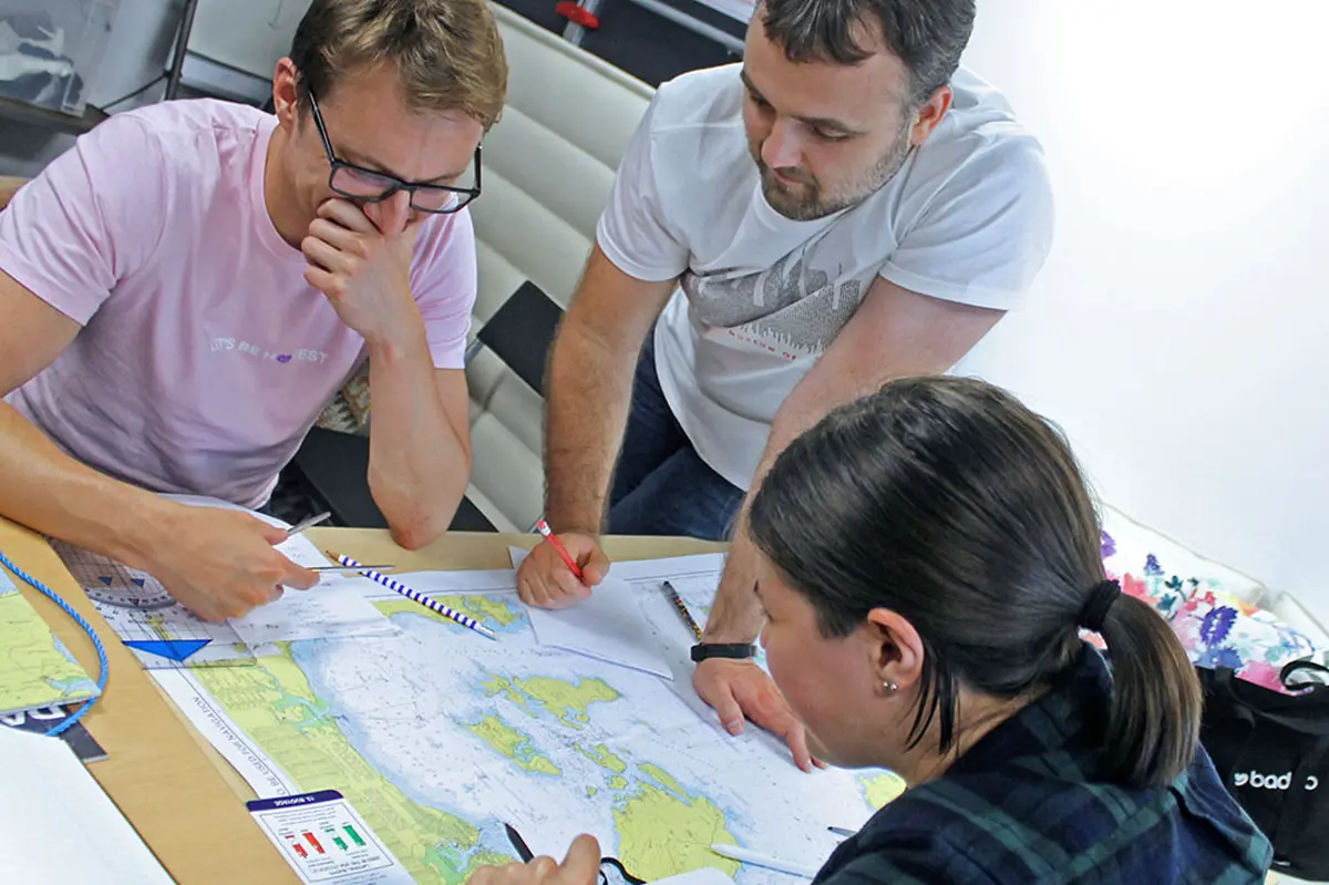 RYA Day Skipper Theory classroom navigation course with chartwork and tidal calculations